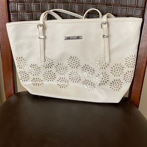White leather Nine West purse with silver flower cut outs